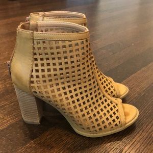 Perforated peep-toe bootie heels